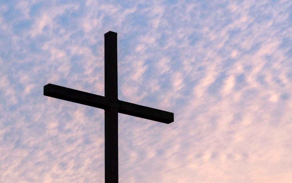Cross against sky image