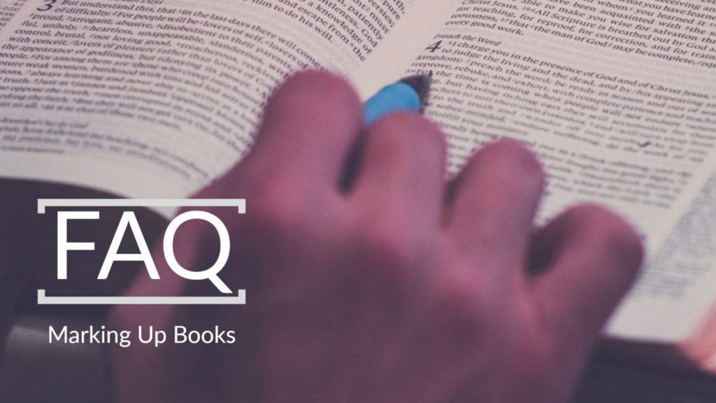 Image of person marking up Bible